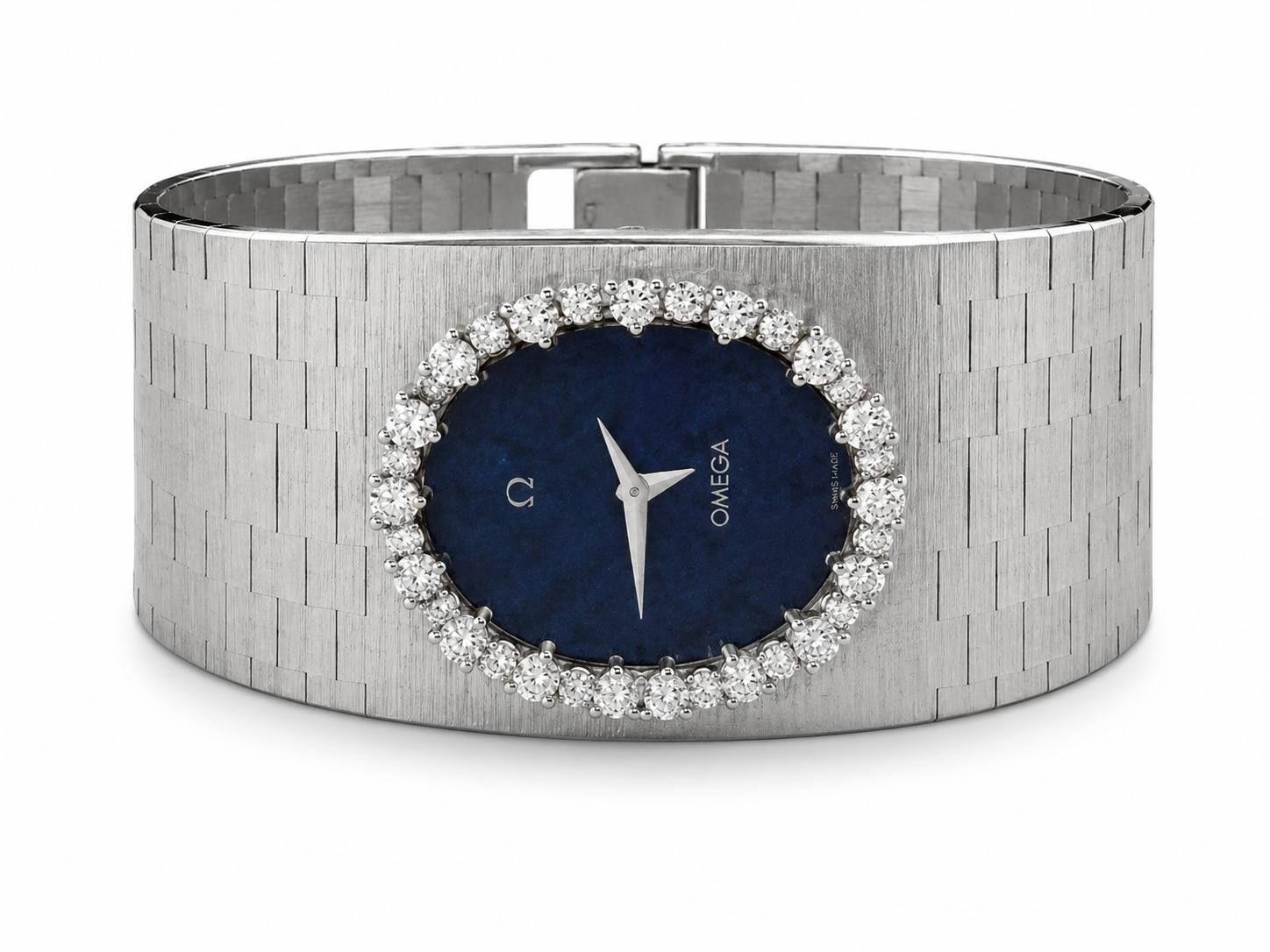 Omega watch with a silver-toned textured metal bracelet, a dark blue oval dial, and a border of clear pavé stones.